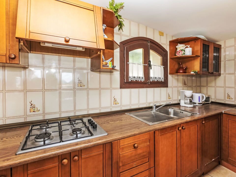 Brown, Cabinetry, Countertop, Property, Kitchen Sink, Sink, Tap, Wood, Plumbing Fixture, Kitchen