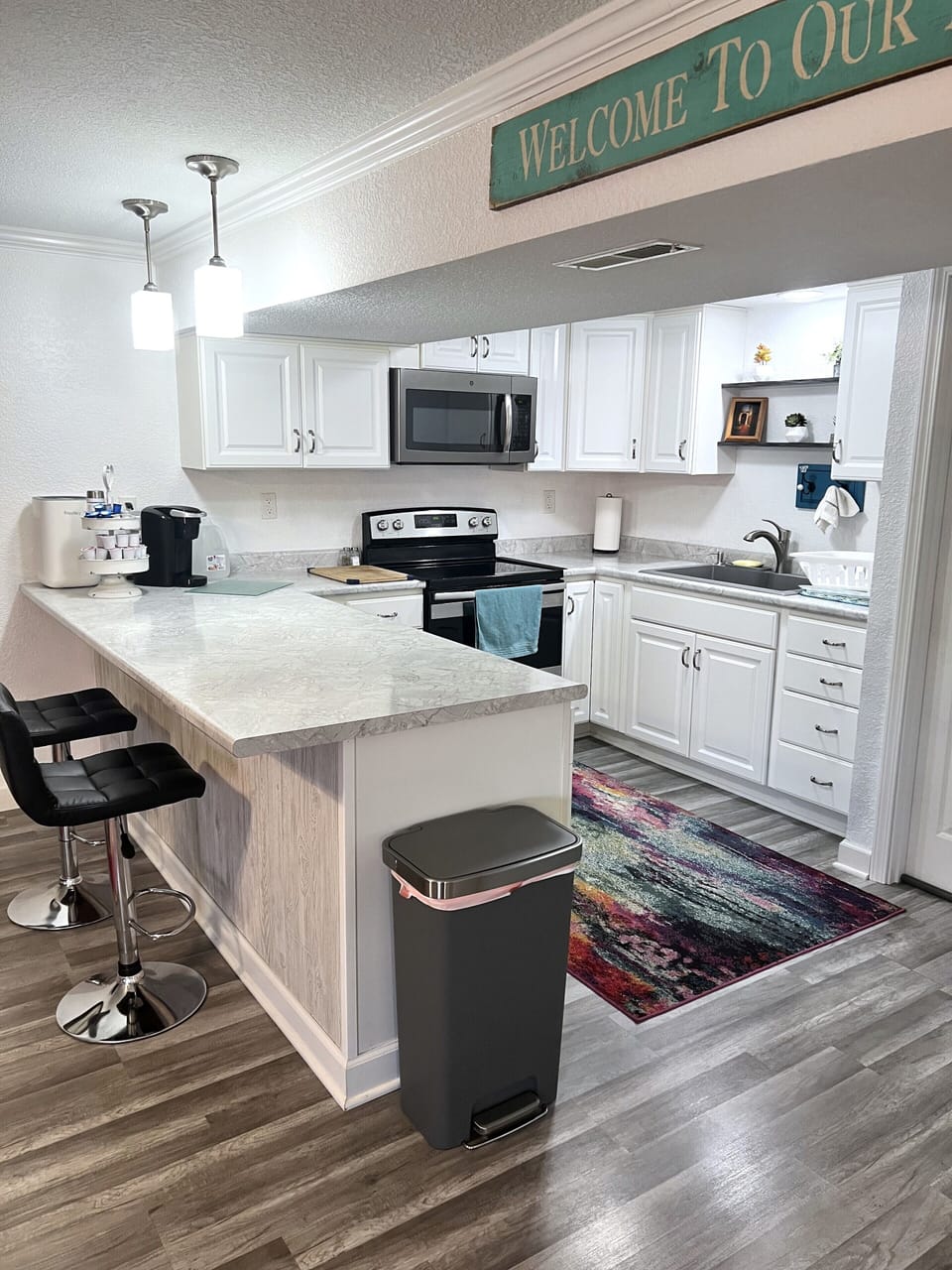 Full kitchen with many cooking tools.