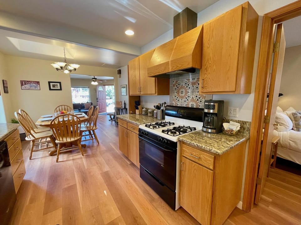 Granite countertops and gas cooking with and externally vented hood