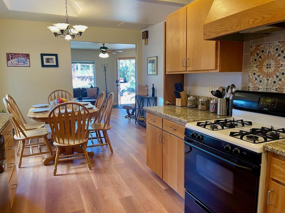 The kitchen is fully stocked with all the dishes and tools you'll need for a great meal at home