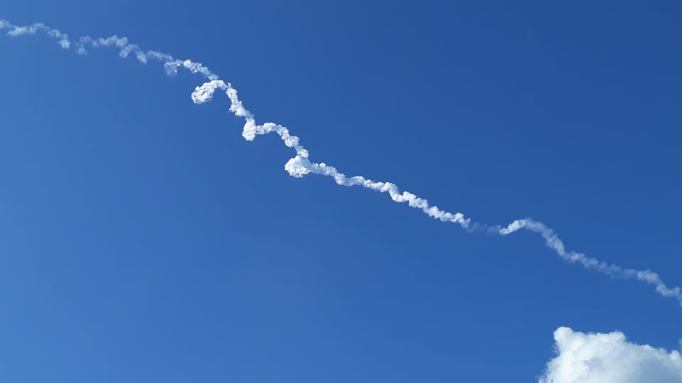 Rocket flying over the dock launched from NASA