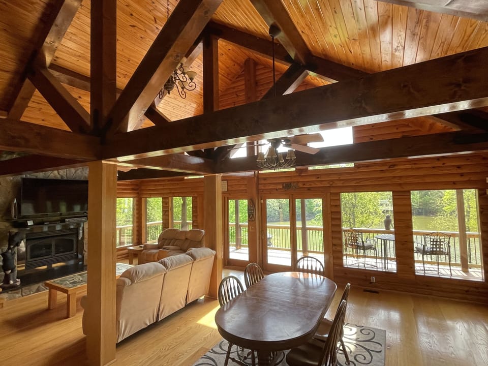 Living room and dining room overlooking lake