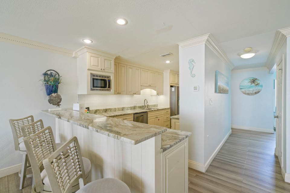 After a sunrise walk along the shore, return to prepare a relaxed breakfast in a space designed for easy vacation living.