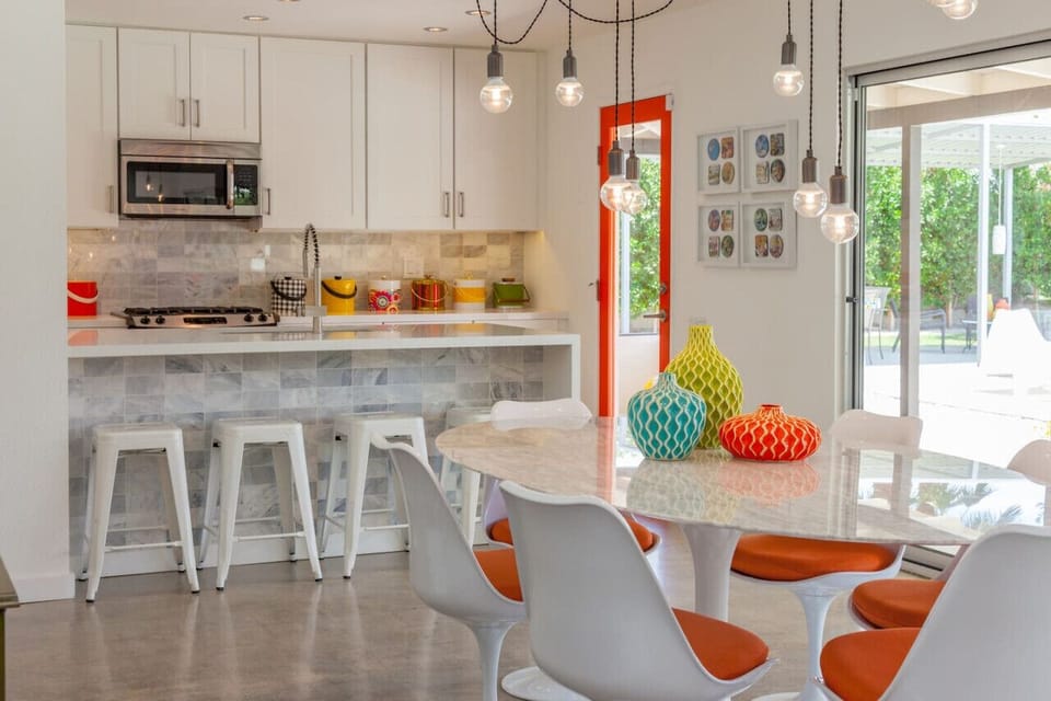 The kitchen is an open concept layout with four bar stools.  The stove is gas and the refrigerator has an ice maker and water filtration system.