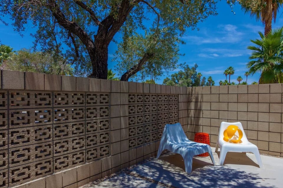 The private front courtyard is accessible from the two guest bedrooms.
