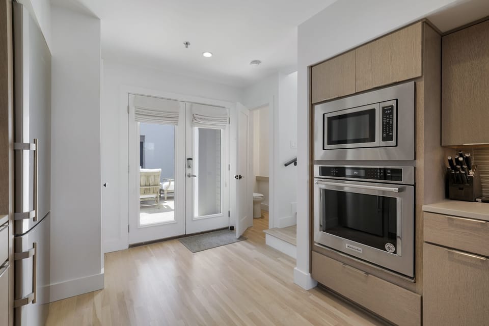 KITCHEN WITH VIEW OF FRONT ENTRANCE