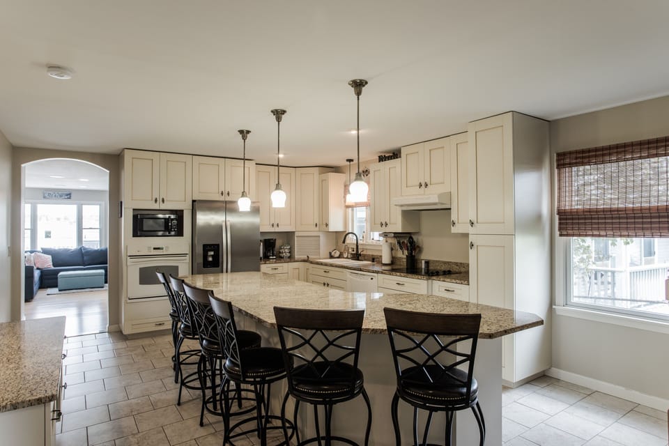 Kitchen with large stone island