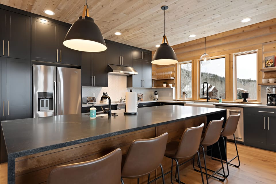 Cook comfortably in the designer kitchen with oversized island.