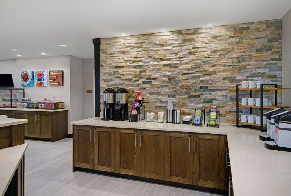 Start your day with a cup of complimentary coffee.