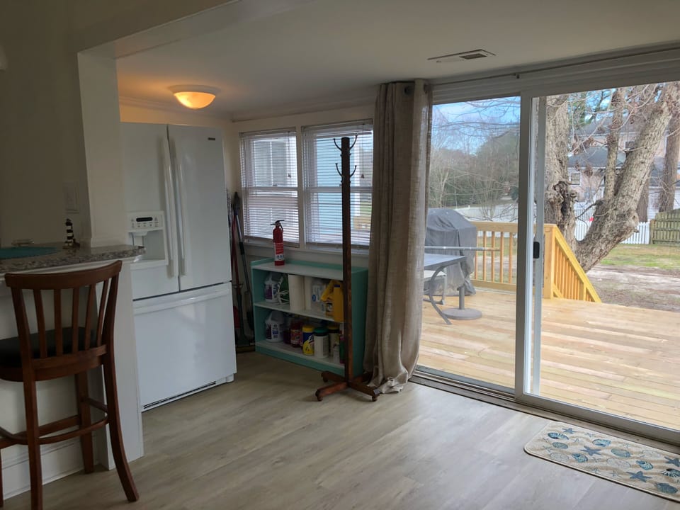 Kitchen and deck.  Refrigerator with Ice Maker and Water dispenser.