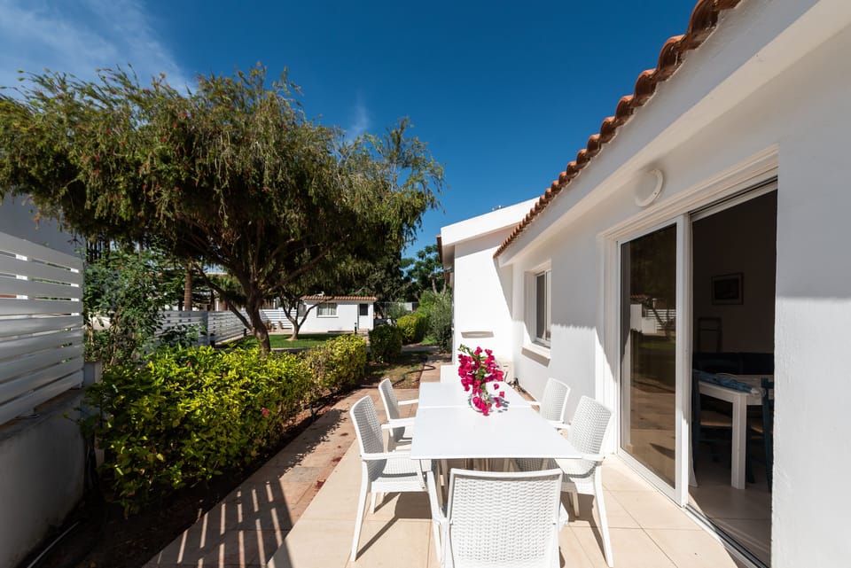 Patio area with dining furniture