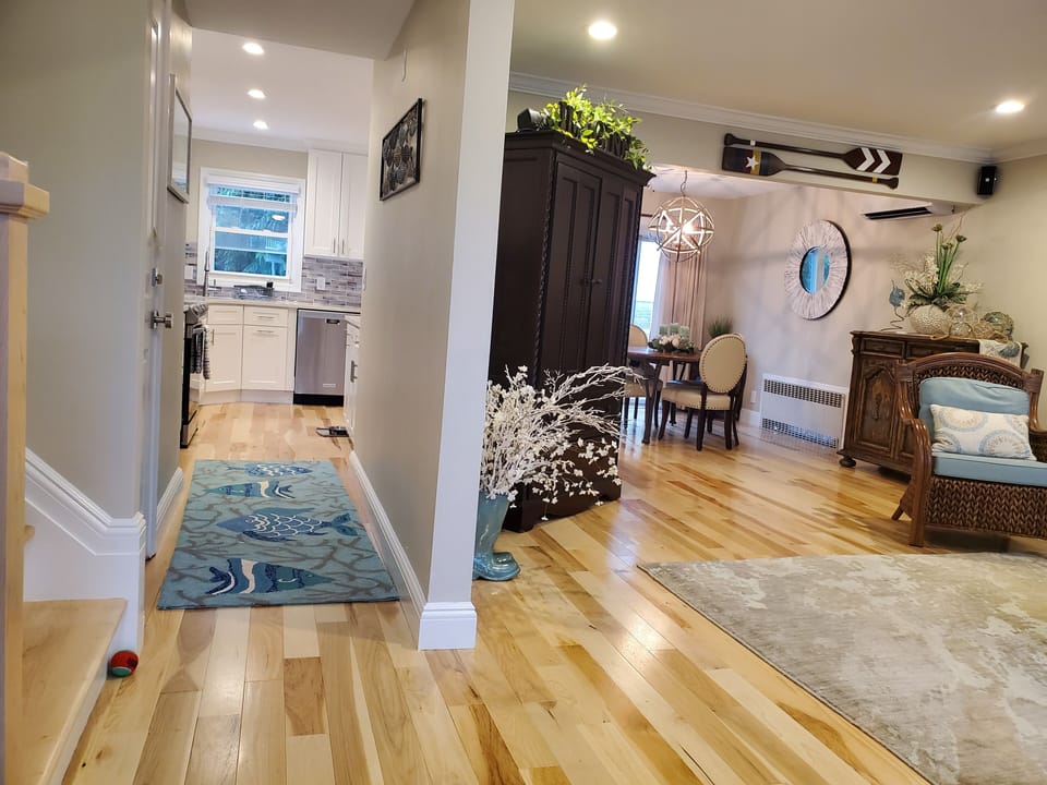 Entry - kitchen straight ahead, LR/DR on right, beds upstairs on left.