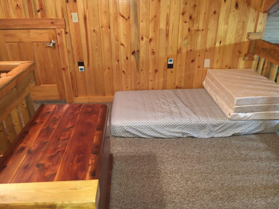 Bedroom 2: loft area with queen bed and twin mattress