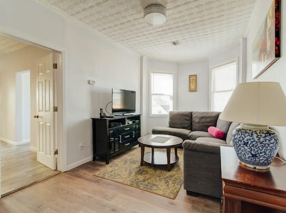 Living room, can be used a separate sleeping area if requested 