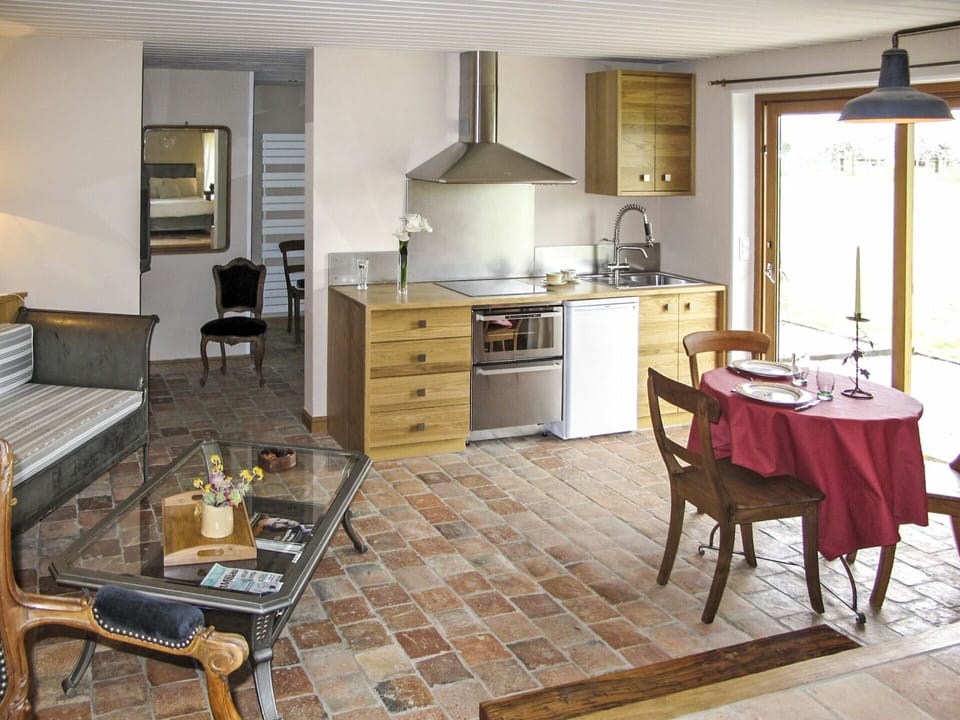 Cabinetry, Furniture, Table, Countertop, Kitchen, Wood, Drawer, Chair, Flooring, Lighting