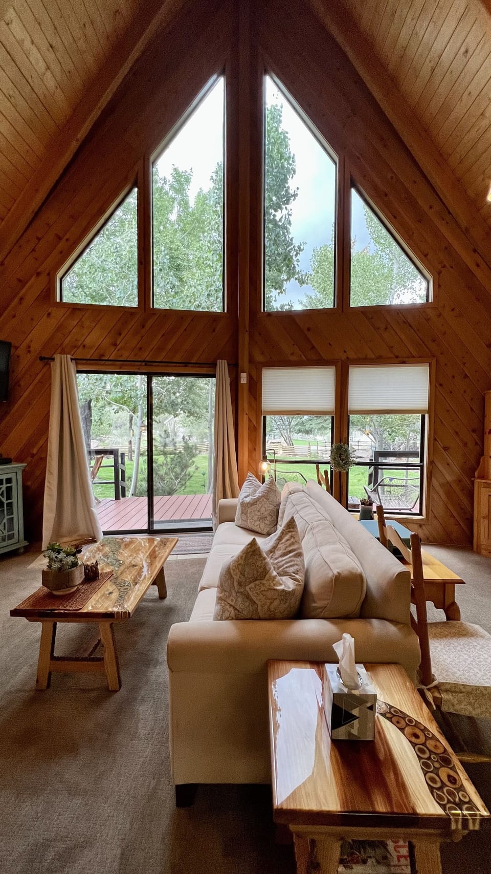 A-Frame charm opens to nature full of birds, deer and the changing seasons.  