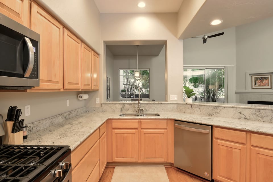 Counter and storage space galore! It's fully stocked with cooking essentials.