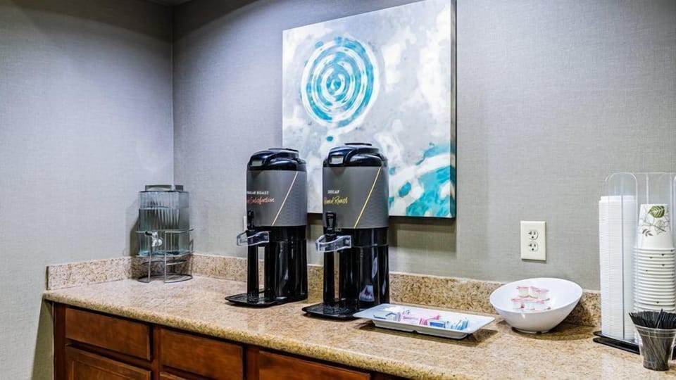 Pour yourself a fresh cup from the dual coffee machines set against granite countertops