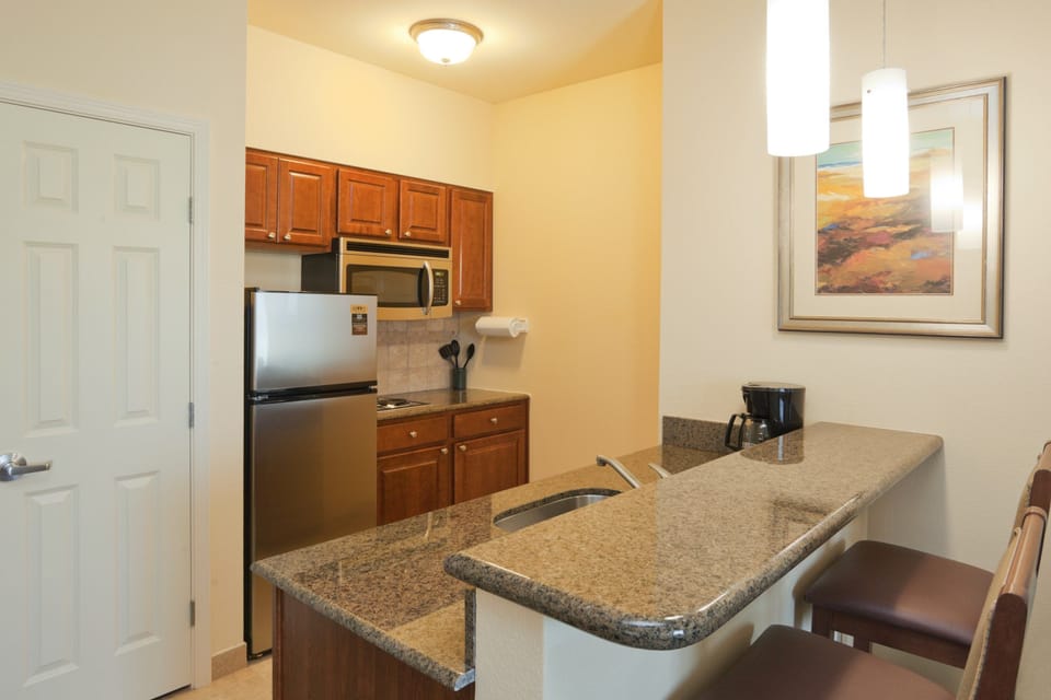 Curb your appetite by cooking a meal in your kitchen.