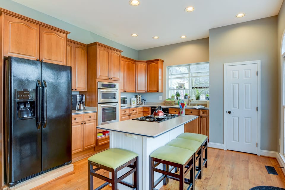 Open kitchen with gas cooktop. 