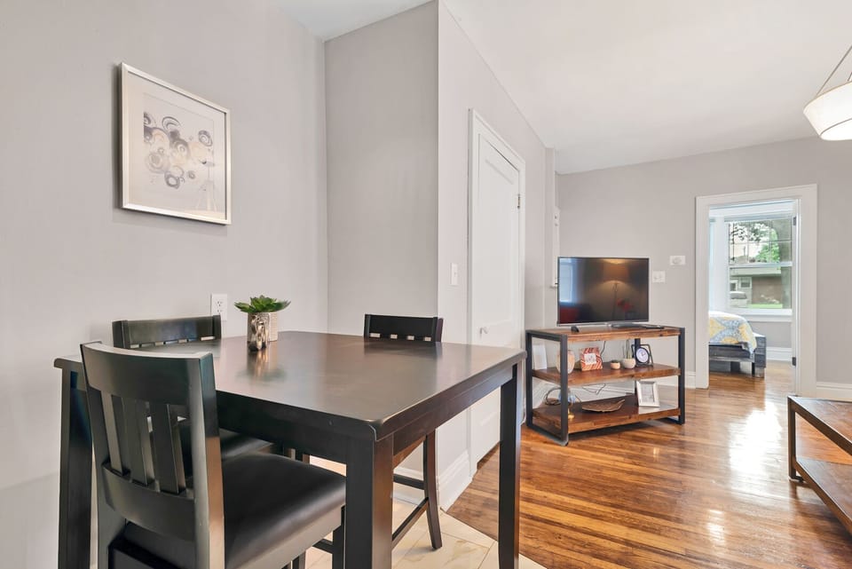 Enjoy dinner at the table while visiting with colleagues in the living room.