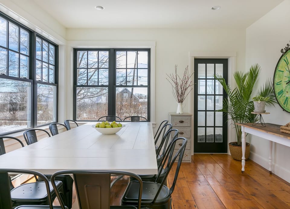 20 smaller chairs also available.  Console serves as overflow dining space.