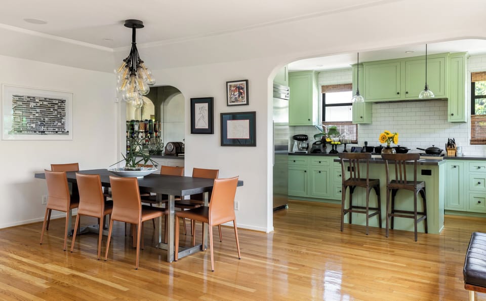 Architecturally designed open floor plan between entertaining spaces.
