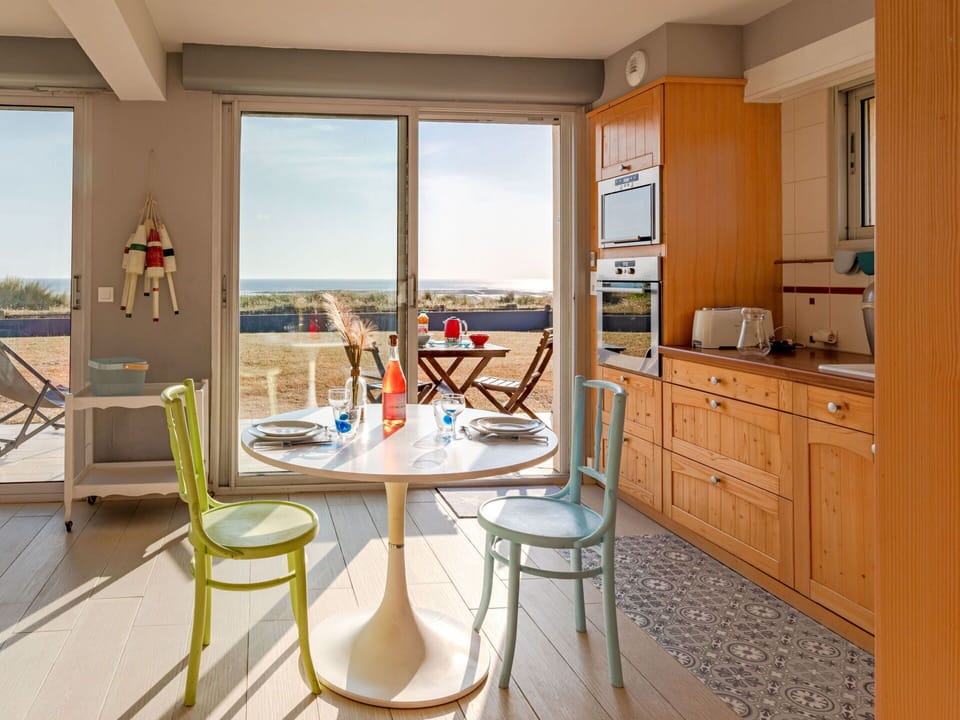 Cabinetry, Furniture, Building, Countertop, Wood, Sky, Interior Design, Chair, Table, Drawer