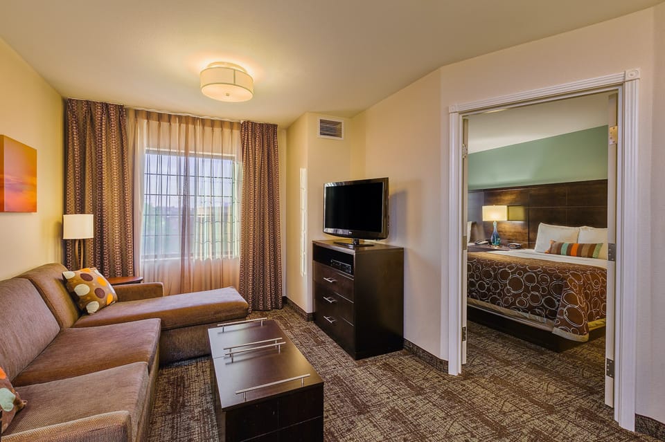 Sink into the cozy sofa after a day exploring the area.