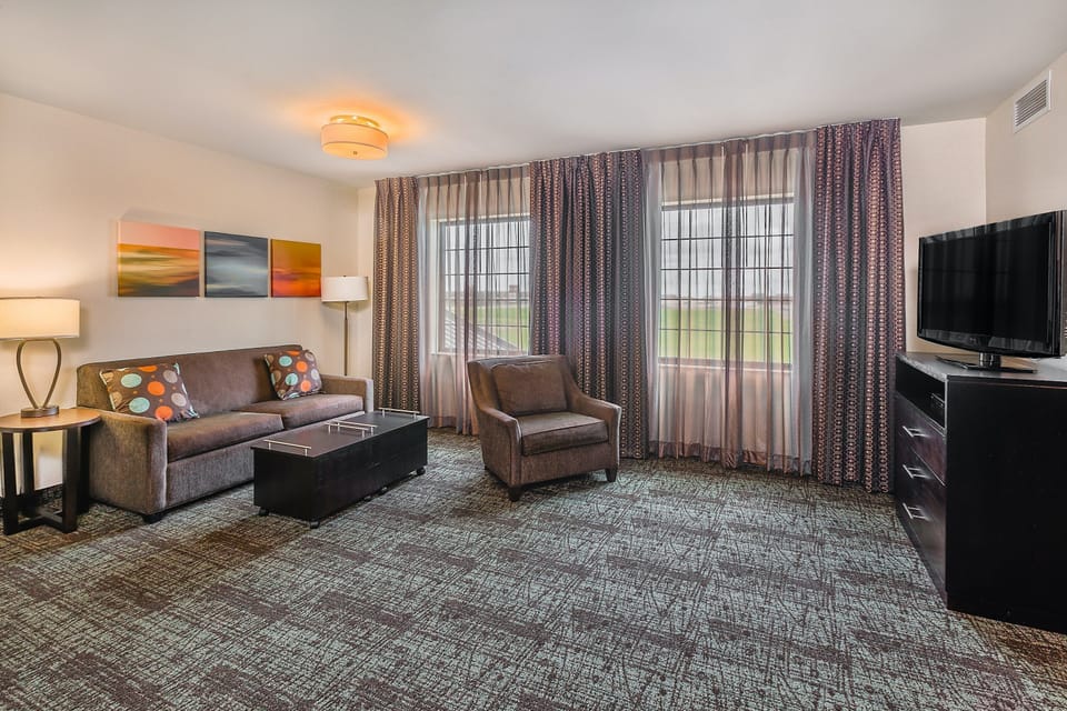 Sink into the cozy sofa after a day exploring the area.