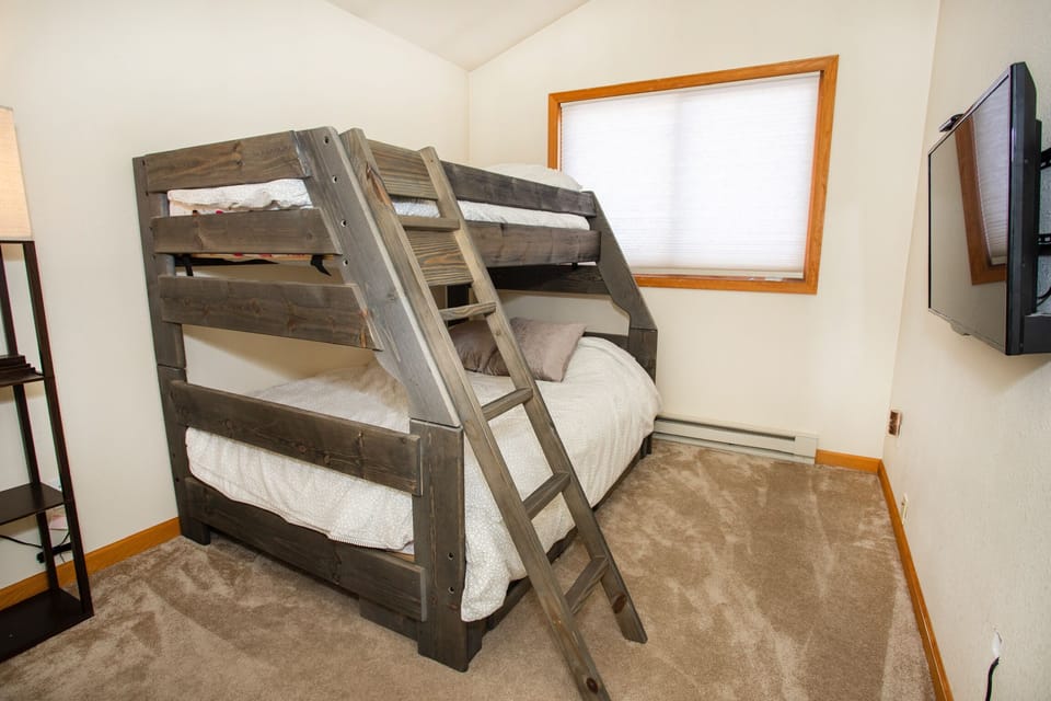  Twin over full bunks with flat screen smart TV