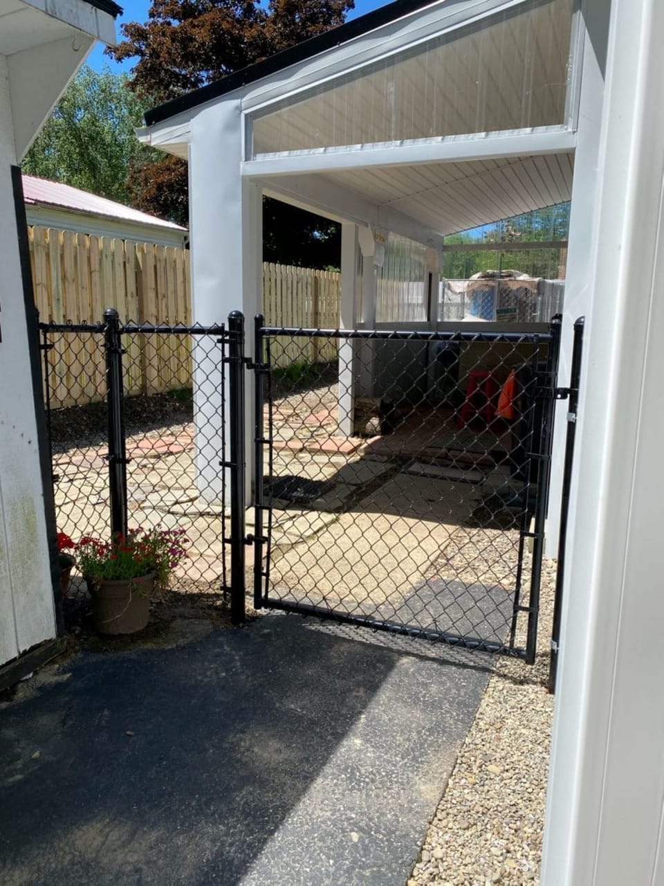 Fully fenced in small backyard for our visiting pups.
