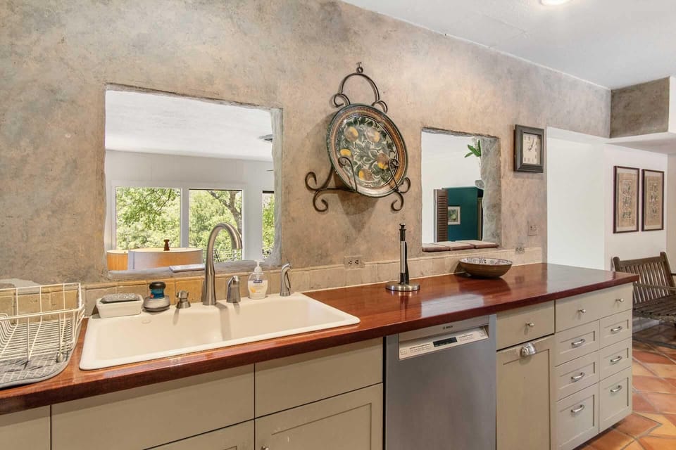 A great big partitioned sink and plenty of counter space assure no one is crowded during meal prep!