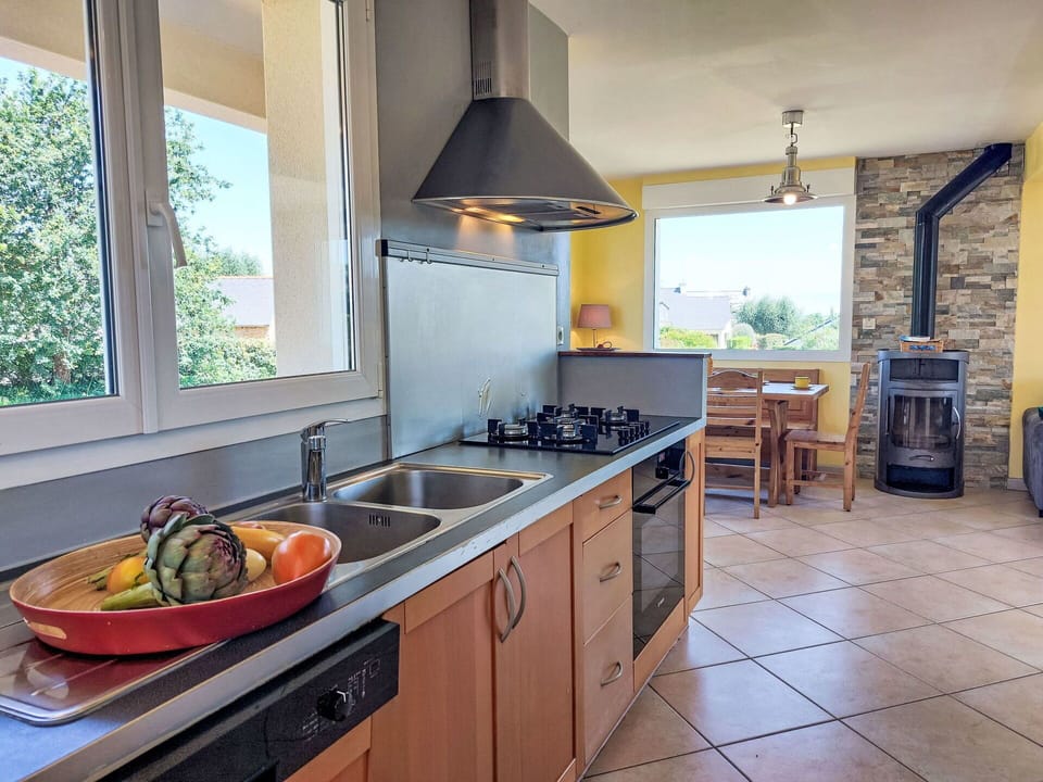 Kitchen, Furniture, Countertop, Interior Design, Flooring, Kitchen Appliance, Major Appliance, Cabinetry, Floor, Lighting