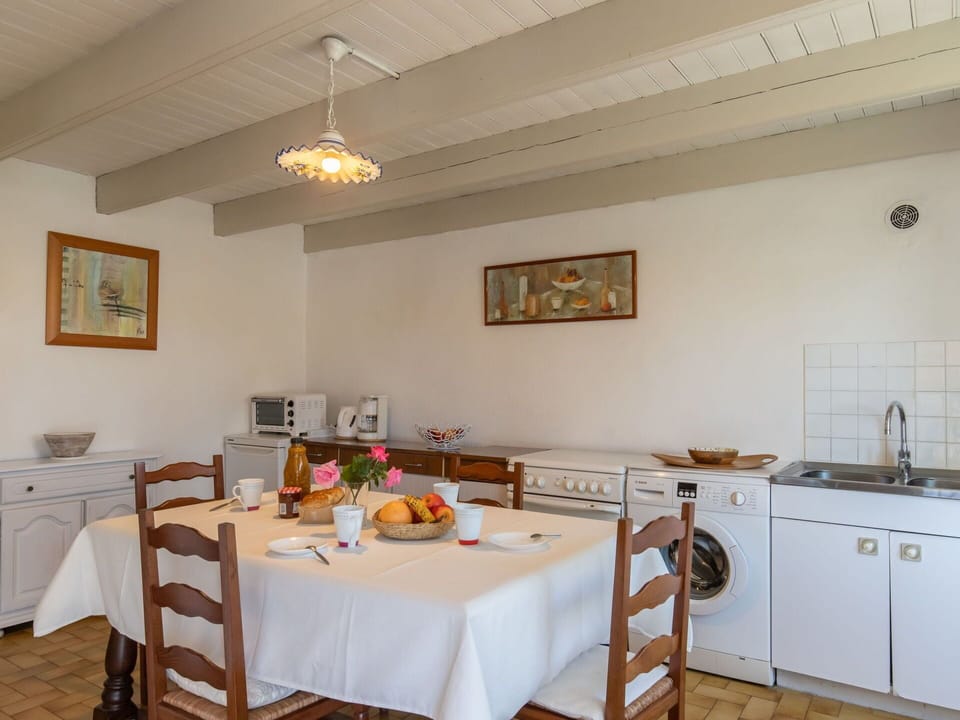 Property, Furniture, Cabinetry, Table, Wood, Lighting, Interior Design, Picture Frame, Countertop, Floor