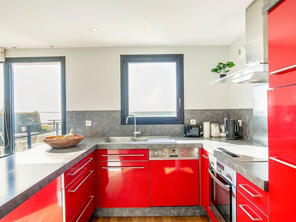 Furniture, Building, Table, Plant, Chair, Houseplant, Shade, Orange, Interior Design, Flooring