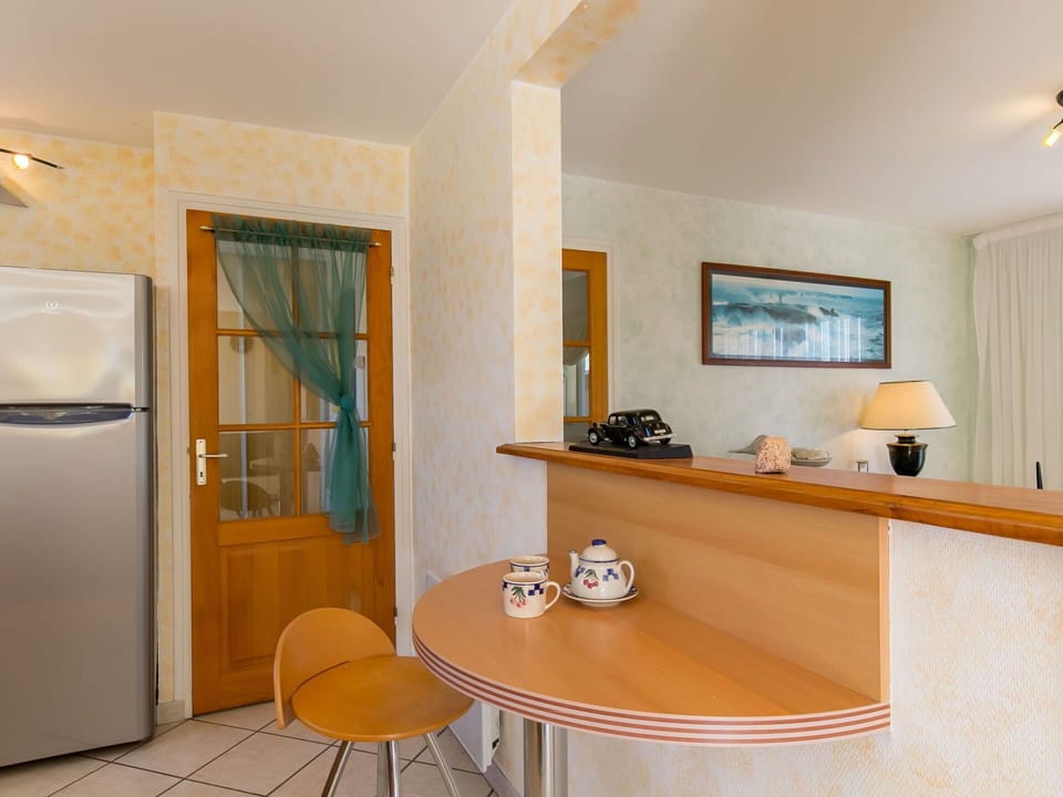 Furniture, Property, Table, Wood, Building, Interior Design, Orange, Home Appliance, Floor, Flooring