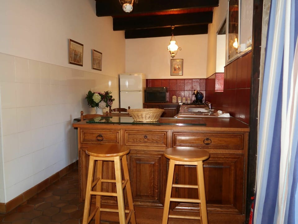 Furniture, Room, Property, Cabinetry, Building, Hardwood, Kitchen, Floor, House, Table