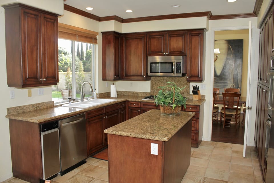 Kitchen with door open to formal dining room