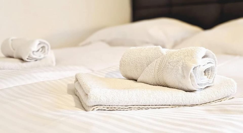 High-quality towels, small selection of shower gel/shampoo and fresh bed linen