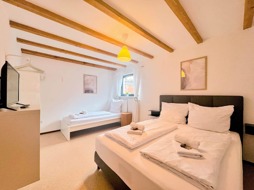 Bedroom Two with double bed and single bed