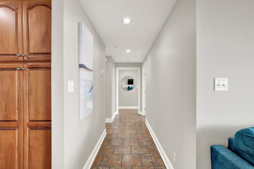 Hallway leading from the living area to the second & third bedrooms.