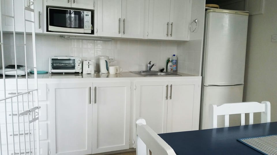 Full self catering kitchette with dining area.