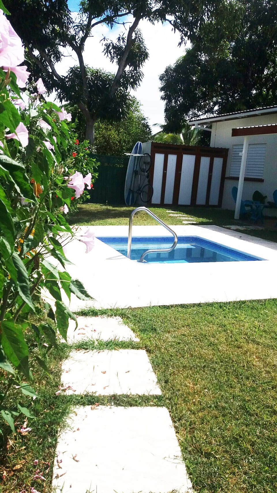 Tropical garden shared with other holiday apartment.