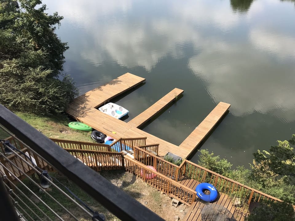Boat dock for 1 boat or swimming and fishing/kayaking.  Also has burn pit/grill 