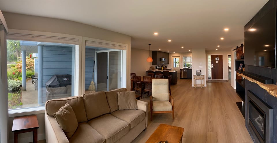 Living room, bbq, dining room and kitchen.