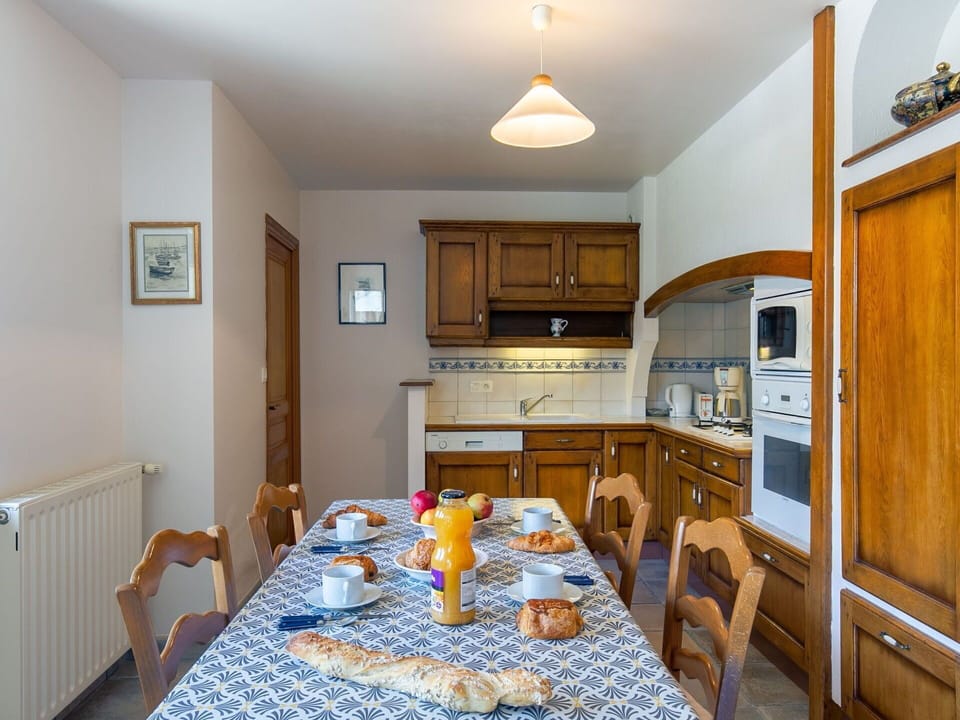 Cabinetry, Furniture, Table, Property, Countertop, Chair, Lighting, Wood, Interior Design, Flooring