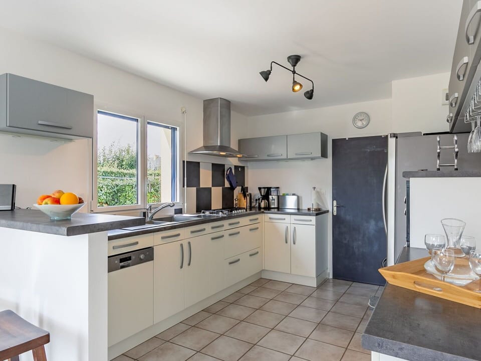 Countertop, Cabinetry, Property, Kitchen Appliance, Kitchen Stove, Kitchen, Kitchen Sink, Home Appliance, Sink, Lighting