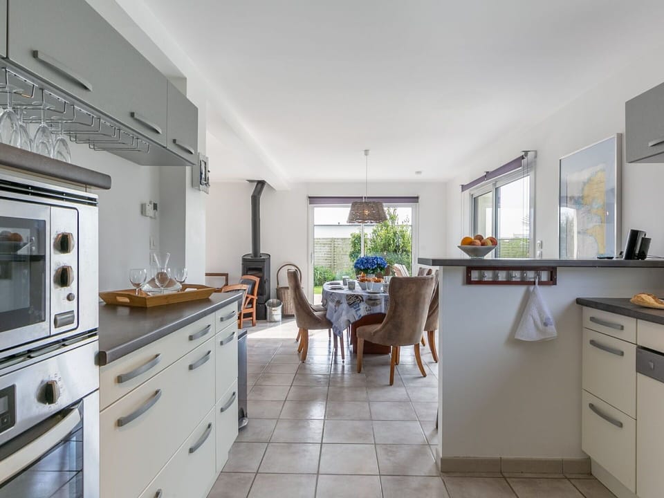 Cabinetry, Countertop, Property, Furniture, Kitchen, Drawer, Wood, Window, Kitchen Stove, Chair