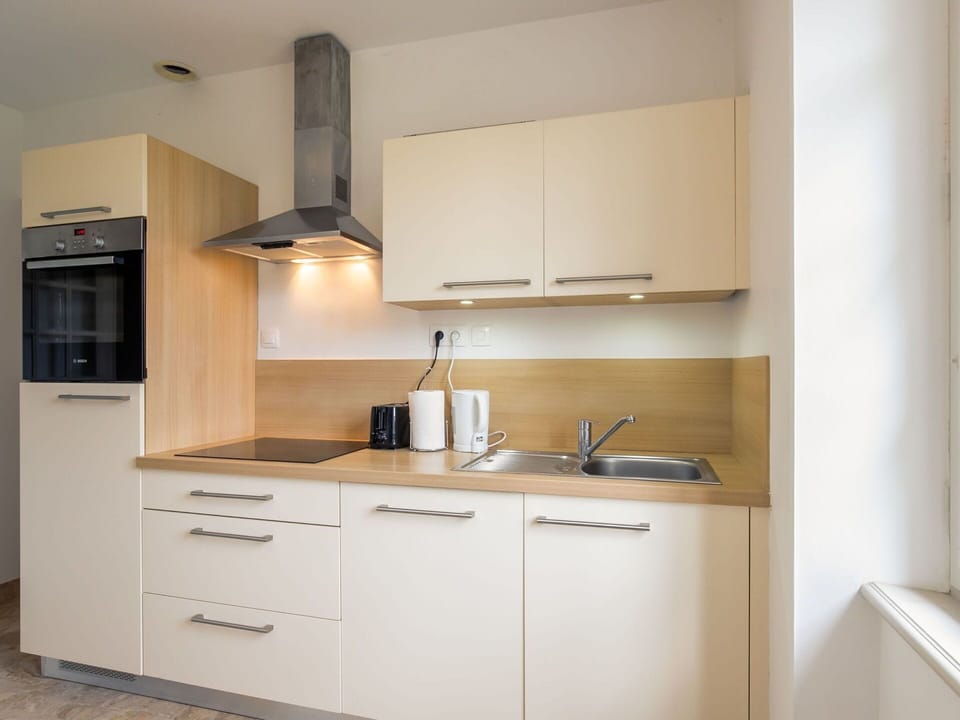 Cabinetry, Countertop, Furniture, Kitchen, Wood, Building, Interior Design, Kitchen Sink, Kitchen Appliance, Kitchen Stove